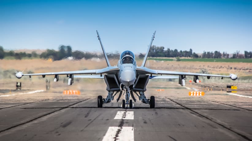 Boeing aircraft on tarmac.