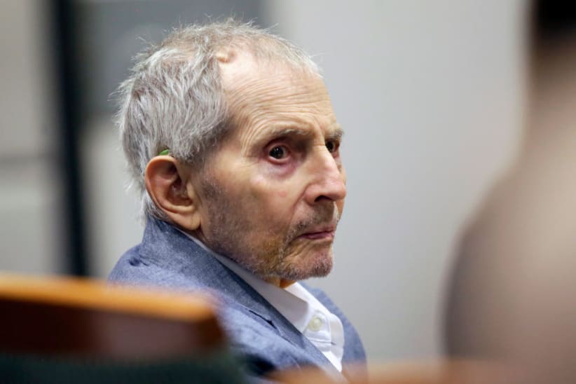 Real estate heir Robert Durst looks over during his murder trial