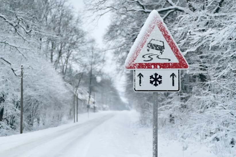 Heavy snowfall on a country road. Driving on it becomes dangerous â ¦