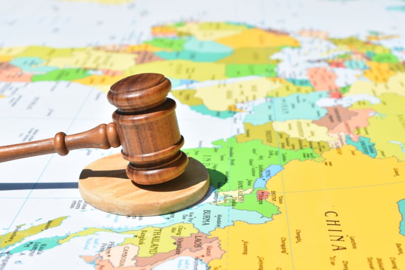 Gavel on world map centered on China