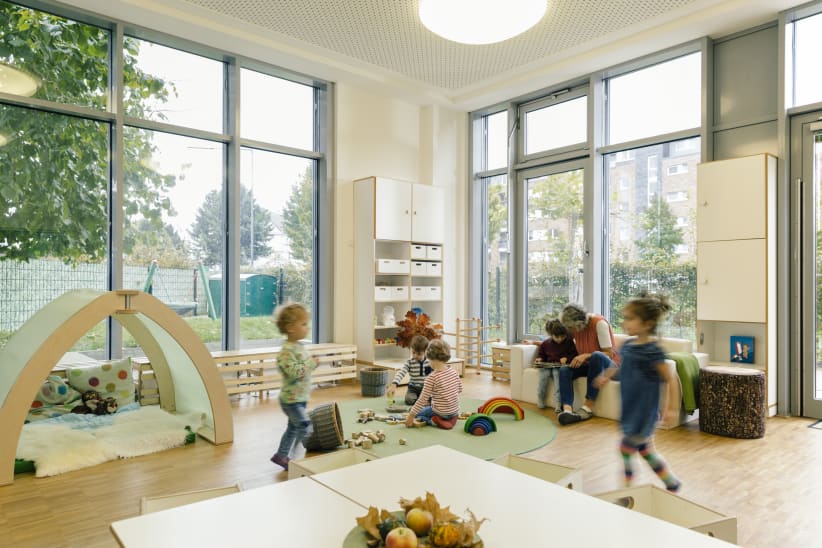 Children play at a daycare.